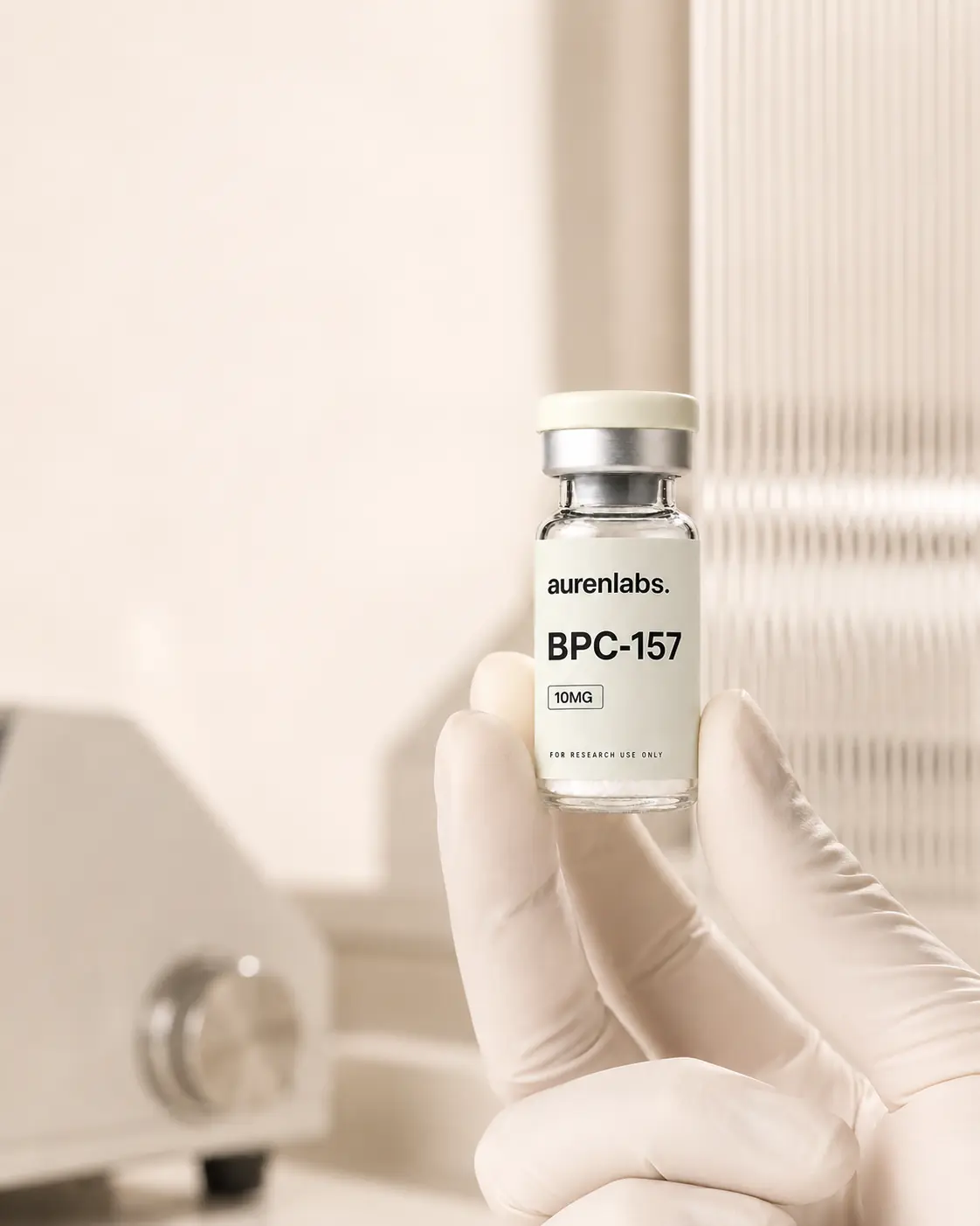 Auren research vial handled carefully in a laboratory setting